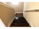 Dark wood stairs with white trim detail at 1783 Shetley Creek Drive, Norcross, GA 30071