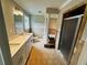 Bright bathroom with double vanity, walk-in shower and soaking tub at 208 Arbour Way, Suwanee, GA 30024