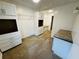 Walk-in closet featuring granite counters, shelving, cabinets and plenty of storage space at 208 Arbour Way, Suwanee, GA 30024