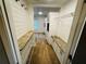 Walk-in closet featuring granite counters, shelving, cabinets and plenty of storage space at 208 Arbour Way, Suwanee, GA 30024