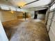 Spacious garage with overhead lighting and painted walls at 208 Arbour Way, Suwanee, GA 30024