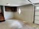 Spacious garage with overhead lighting and painted walls at 208 Arbour Way, Suwanee, GA 30024