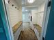 Hallway with built-in shelving and a view into another room at 208 Arbour Way, Suwanee, GA 30024