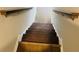 Hardwood stairs lead to upper level with decorative handrails for a touch of elegance and safety at 208 Arbour Way, Suwanee, GA 30024