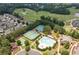 Community aerial view featuring pool, tennis courts, playground, and golf course creating a luxurious and active lifestyle at 214 Misty View Dr, Canton, GA 30114