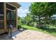 The backyard features a flagstone patio and manicured lawn, perfect for outdoor enjoyment at 214 Misty View Dr, Canton, GA 30114