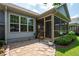 The backyard features a flagstone patio that leads to a screened in porch at 214 Misty View Dr, Canton, GA 30114
