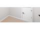 A bonus room or basement area with a closet and access to storage space at 214 Misty View Dr, Canton, GA 30114