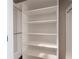 Closet with multiple shelving units and room for organizing personal items at 214 Misty View Dr, Canton, GA 30114