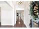 Open foyer features hardwood floors and a view into the living area with a fireplace at 214 Misty View Dr, Canton, GA 30114