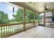 Inviting screened porch boasts wood floors and scenic views, creating a tranquil outdoor retreat at 214 Misty View Dr, Canton, GA 30114
