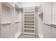 Walk-in closet with custom shelving and ample space for organization at 214 Misty View Dr, Canton, GA 30114