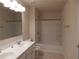Clean bathroom features a tub/shower combination and a double sink vanity at 2199 Landing Walk Dr, Duluth, GA 30097