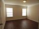 Bright bedroom with crown molding and hardwood flooring at 2199 Landing Walk Dr, Duluth, GA 30097