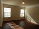 Bedroom with hardwood floors, crown molding, and natural light at 2199 Landing Walk Dr, Duluth, GA 30097