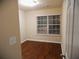 Cozy bedroom with hardwood floors and a window providing natural light at 2199 Landing Walk Dr, Duluth, GA 30097