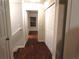 Hallway with closet leading to a sunlit room at 2199 Landing Walk Dr, Duluth, GA 30097