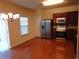 Open kitchen with stainless steel appliances and a chandelier above the island at 2199 Landing Walk Dr, Duluth, GA 30097