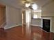 Spacious living room with hardwood floors, fireplace, and open floor plan at 2199 Landing Walk Dr, Duluth, GA 30097