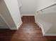 Top-down view of staircase featuring wooden steps and white trim at 2199 Landing Walk Dr, Duluth, GA 30097