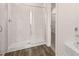 Modern bathroom featuring a glass-enclosed shower with stylish tilework and sleek hardware at 321 Sound Cir, Stockbridge, GA 30281