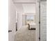 Spacious bedroom with plush carpet, ample natural light, and neutral color palette at 321 Sound Cir, Stockbridge, GA 30281