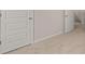 Bright hallway featuring neutral walls and carpet, perfect for seamless home decor integration at 321 Sound Cir, Stockbridge, GA 30281