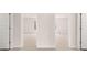 Spacious hallway provides an entryway to the bedrooms of this home at 321 Sound Cir, Stockbridge, GA 30281