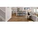 Open concept kitchen with stainless steel appliances, granite countertops, and bar stool seating at the island at 321 Sound Cir, Stockbridge, GA 30281