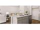 Modern kitchen with granite countertops and stainless steel appliances, seamlessly connecting to the living area at 321 Sound Cir, Stockbridge, GA 30281