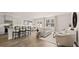 Open-concept living area with modern decor and hardwood floors at 321 Sound Cir, Stockbridge, GA 30281