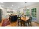 Spacious kitchen featuring white cabinets, an island, and stainless steel appliances at 3609 Meadow Chase Dr, Marietta, GA 30062