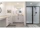 Bathroom boasts a modern vanity, stylish mirror, and sleek glass-enclosed shower at 361 Princeton Way, Lawrenceville, GA 30044