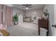 Charming Bedroom with a crib, dresser, decor, a plant, and a comfortable chair; designed with comfort in mind at 361 Princeton Way, Lawrenceville, GA 30044
