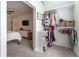 Walk-in closet offers ample storage space with shelving and hanging racks at 361 Princeton Way, Lawrenceville, GA 30044