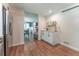 Charming kitchen features wood floors, bright cabinets and counters, and stainless appliances at 361 Princeton Way, Lawrenceville, GA 30044