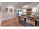 Open living room features a fireplace, hardwood flooring, and neutral paint, perfect for entertaining and relaxation at 361 Princeton Way, Lawrenceville, GA 30044