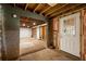 Spacious unfinished basement with ample storage and exposed ceiling beams at 3992 Joshua Ln, Douglasville, GA 30135