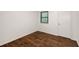 Cozy bedroom with hardwood floors, window and neutral walls at 3992 Joshua Ln, Douglasville, GA 30135