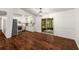 Open kitchen featuring white cabinets, stainless steel appliances and hardwood floors at 3992 Joshua Ln, Douglasville, GA 30135