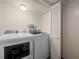 Well-equipped laundry room featuring modern washer and dryer units at 3992 Joshua Ln, Douglasville, GA 30135