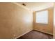 Compact bedroom with carpet, neutral walls, and a window at 879 Sylvan Sw Pl, Atlanta, GA 30310
