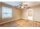 Empty bedroom showcasing hardwood floors and bright natural light at 879 Sylvan Sw Pl, Atlanta, GA 30310