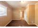 Cozy bedroom featuring neutral walls, plush carpet, and a window offering natural light at 879 Sylvan Sw Pl, Atlanta, GA 30310