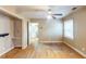 Empty bedroom showcasing hardwood floors and a closet and bathroom at 879 Sylvan Sw Pl, Atlanta, GA 30310