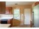 Functional kitchen featuring classic cabinets, ample counter space, and durable appliances at 879 Sylvan Sw Pl, Atlanta, GA 30310