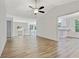 Spacious home featuring light-colored wood-look floors, stairs and a large kitchen at 733 Wesley Chapel Rd, Villa Rica, GA 30180
