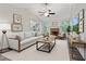 Cozy living room featuring vaulted ceilings, fireplace and natural lighting at 733 Wesley Chapel Rd, Villa Rica, GA 30180