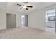 View of the main bedroom leading into an en-suite bath and walk in closet at 733 Wesley Chapel Rd, Villa Rica, GA 30180