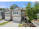 Charming two-story townhome with an attached garage and a cozy second-floor balcony at 774 Belrose Dr, Smyrna, GA 30080